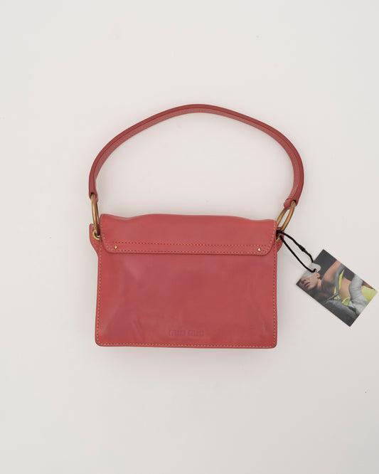 2000s MIU MIU Pink Cutout Leather Grommet Bag