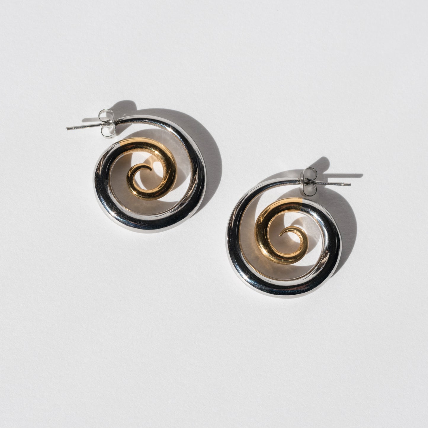 CC Two Toned Stainless Steel Swirl Hoops