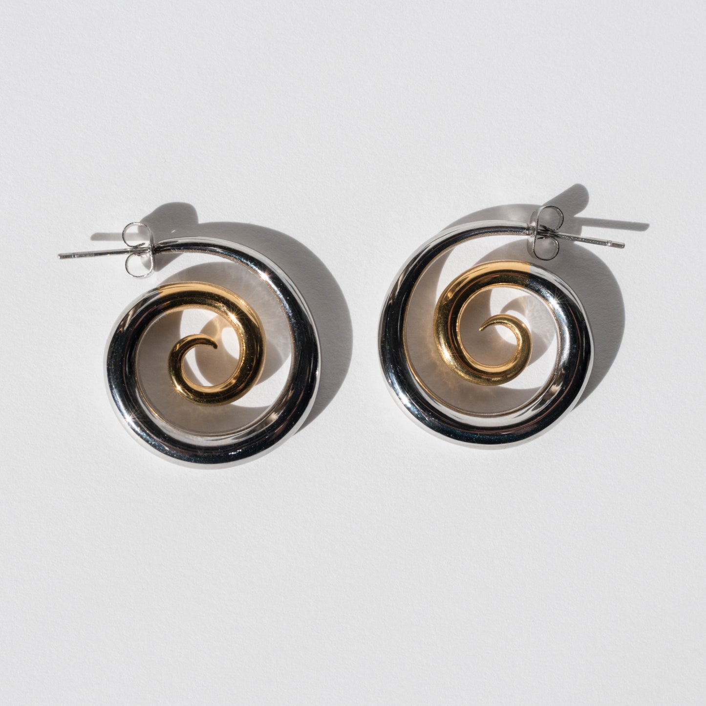 CC Two Toned Stainless Steel Swirl Hoops
