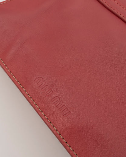 2000s MIU MIU Pink Cutout Leather Grommet Bag