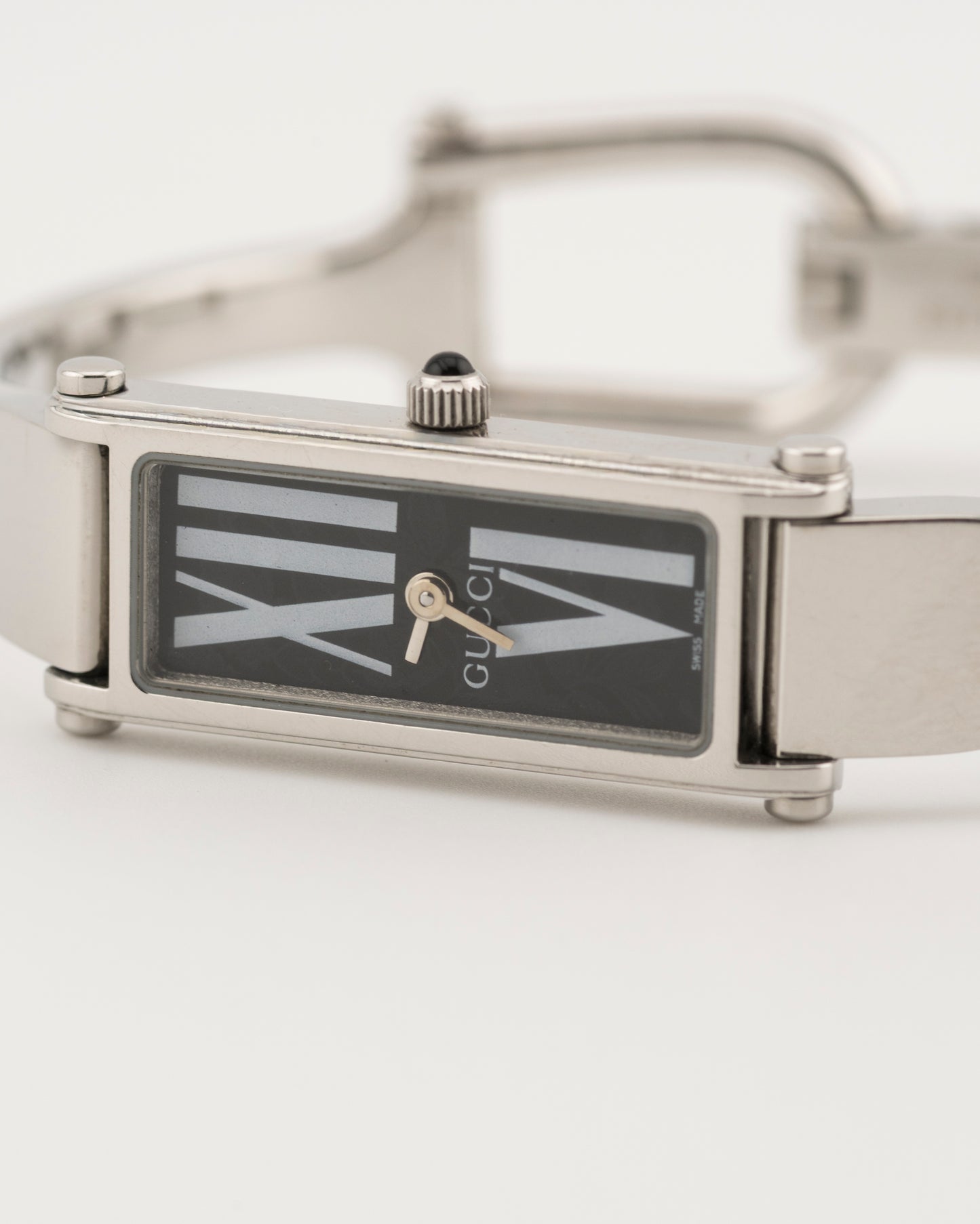 90s GUCCI 1500L Silver Roman Numeral Bangle Watch