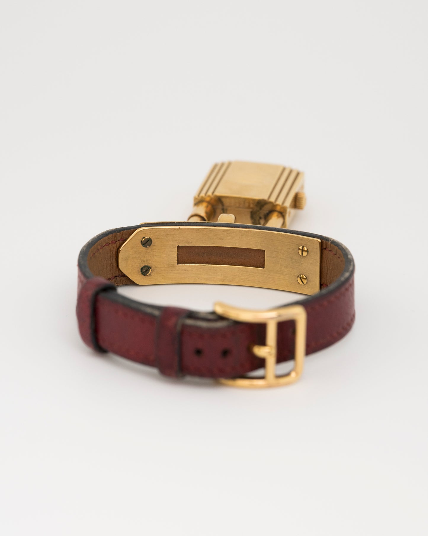 90s HERMES Kelly Maroon Padlock Watch