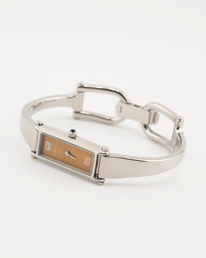 90s GUCCI 1500L Amber Dial Silver Bangle Watch