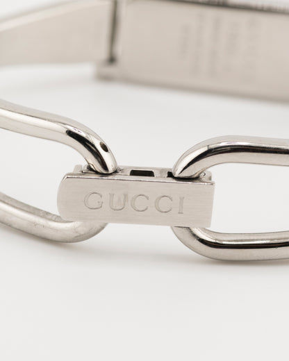 90s GUCCI 1500L Amber Dial Silver Bangle Watch