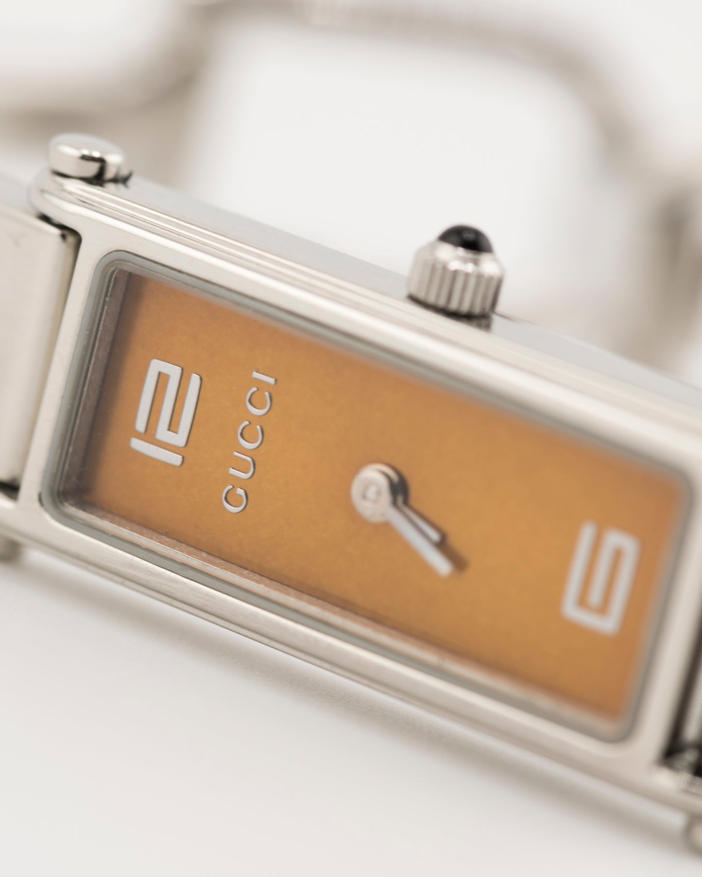 90s GUCCI 1500L Amber Dial Silver Bangle Watch