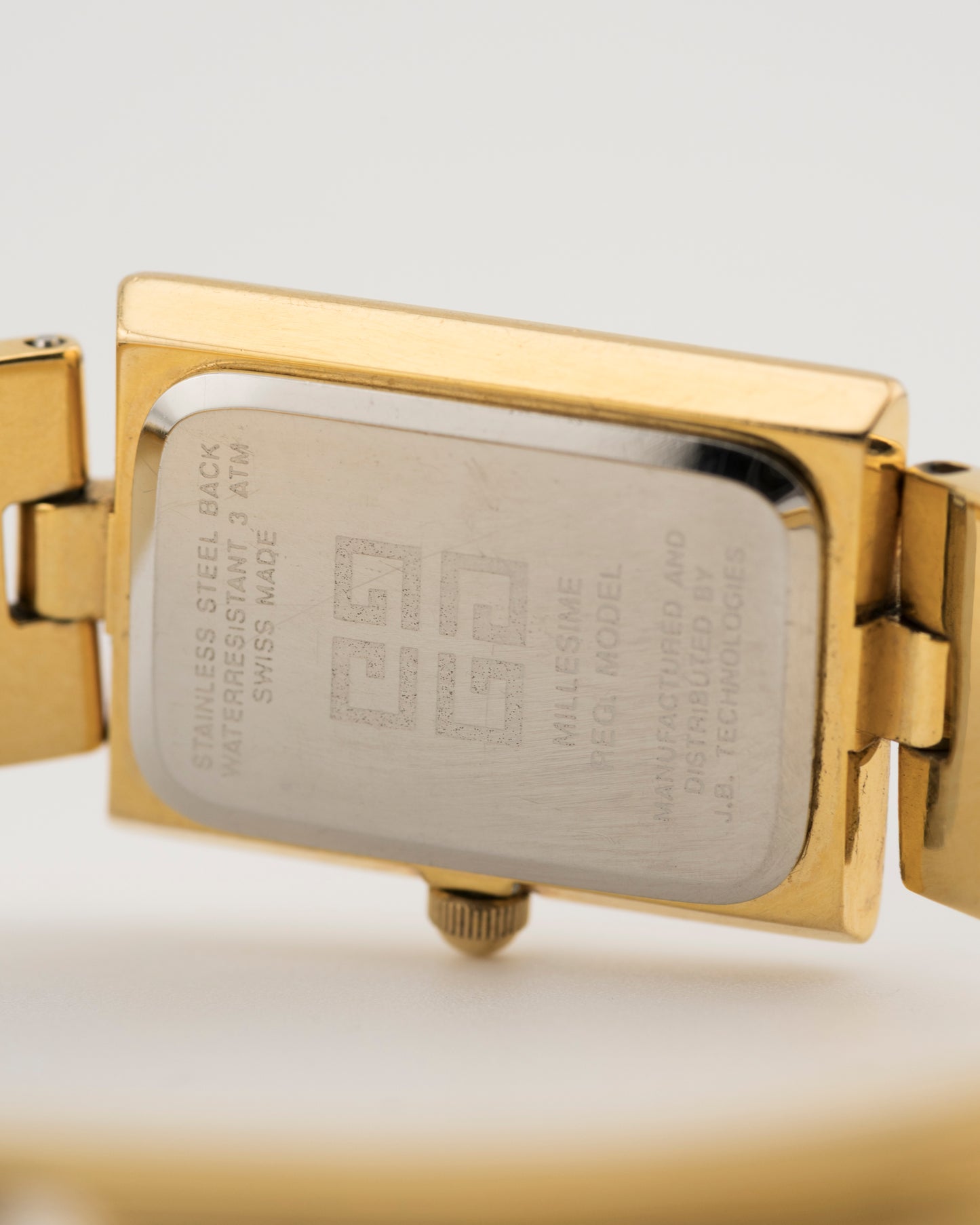 90s GIVENCHY Millesime Gold Bangle Watch