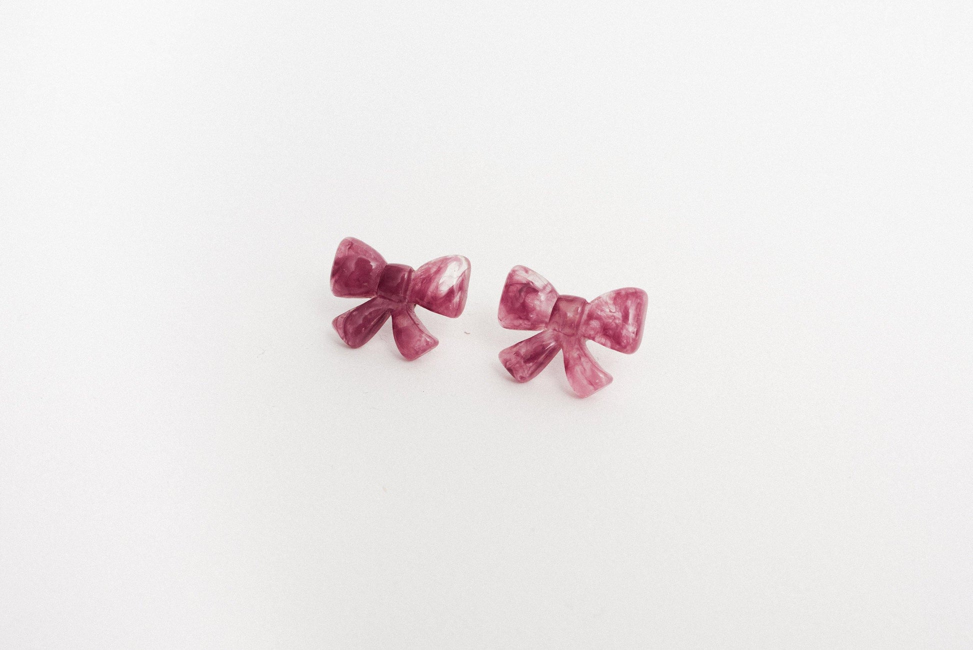 Dainty Plum Bow Earrings - Closed Caption | Shop Vintage + Handmade. Always Sustainable. Never Wasteful.