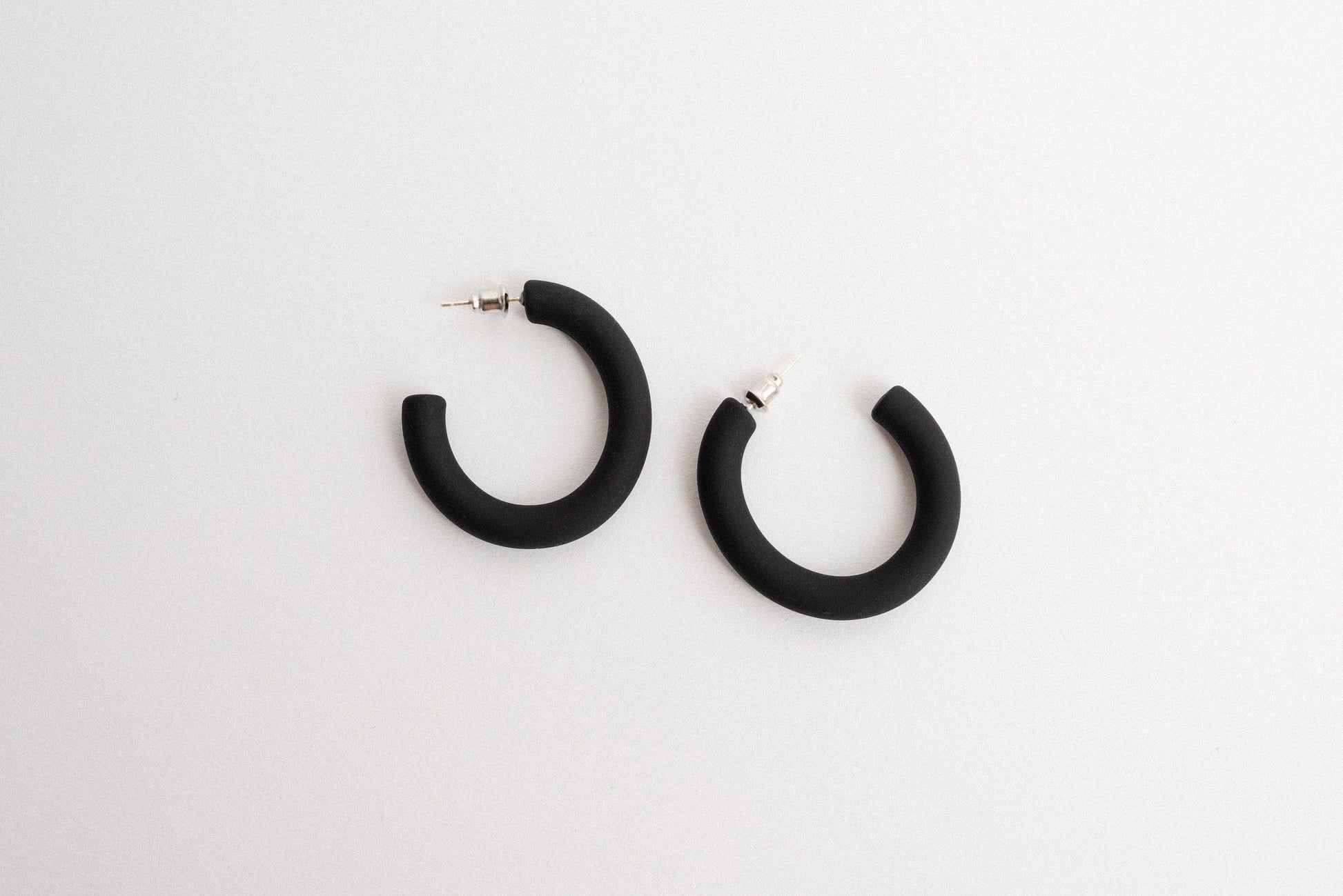 Black Hoop Earrings - Closed Caption | Shop Vintage + Handmade. Always Sustainable. Never Wasteful.